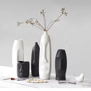 <span class=keywords><strong>Vase</strong></span> à fleurs <span class=keywords><strong>en</strong></span> porcelaine céramique pour salon <span class=keywords><strong>en</strong></span> <span class=keywords><strong>forme</strong></span> <span class=keywords><strong>de</strong></span> visage humain <span class=keywords><strong>tête</strong></span> blanche noire personnalisée - Product Image 1