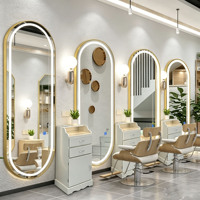 Ensemble de mobilier de salon moderne noir et or : Fauteuil de coiffure, lit de lavage, miroir LED, chariot et équipement de coiffure pour barbier