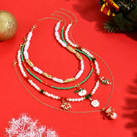 Collier unisexe européen et américain en alliage de zinc plaqué or 18 carats, imitation perle, pendentif créatif bonhomme de neige et cloche, cadeau de Noël
