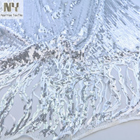 Tissu Nanyee tricoté brodé à paillettes miroir argentées élastiques avec pompons pour jupe de danse orientale ou de mariage