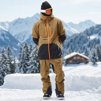 Blouson d'hiver matelassé imperméable pour homme avec capuche, design color block, fermeture éclair, rembourrage épais en polyester