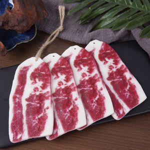 Réplica a escala 1:1 de carne de res (hombro de cerdo) con textura de mármol, para cortavideos y videos de televisión; también como utilería para carne de res marinada. - Product Image 4