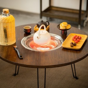 Một bàn tròn gấp di động để sử dụng ngoài trời thích hợp cho sử dụng trong nhà với một ngọn lửa sân phổ biến - Product Image 4