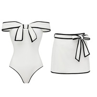 Bikini une pièce JSN 2026 personnalisé pour femme, nouvelle collection, noir et blanc, bandeau, détail nœud, avec robe de bain, vêtements de plage