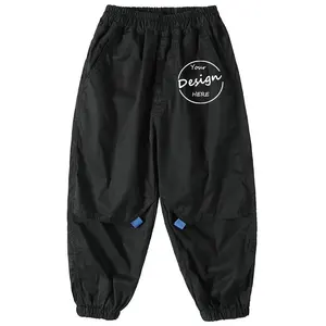 Pantalones holgados con Logo personalizado para niños, calzas largas de nailon, color caqui