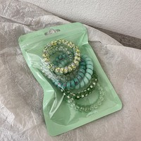 Spirales capillaires colorées effet bonbon pour l'été, élastiques minimalistes pour queue de cheval quotidienne