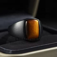 Gentdes Jewelry Bague chevalière en acier inoxydable noir incrustation de pierre d'oeil de tigre jaune Chevalière pour homme