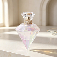 Flacon de parfum de luxe en verre en forme de diamant 100ml 3.4oz Corps irisé à facettes Collier en cristal doré Vente en gros