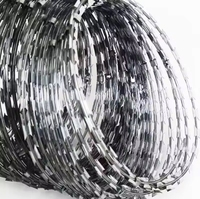Precio de alambre de púas, medidor de esgrima de púas en Egipto, rollo de valla galvanizada por para granja, cinta de malla de concertina a prueba de óxido