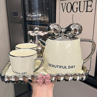 Luxuriöses Modernes Keramik-Porzellan-Teeservice Kreatives Windbogen-Kaltgetränke-Set mit Kanne, Tasse und Tablett Umweltfreundliches Hochwertiges JADE Marken-Milchset