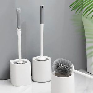 Ensemble de brosses de toilette avec base ronde gris-blanc, design ergonomique pour le nettoyage des cuvettes et des éviers - Product Image 1