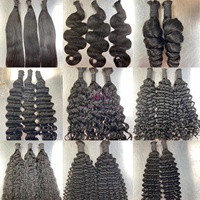 Cheveux birmans bruts non traités 12A Extension de tissage de cheveux bouclés eurasiens de printemps Paquets de cheveux alignés sur des cuticules Couleur noire