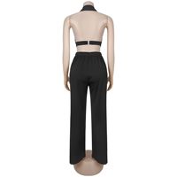 Ensemble deux pièces sexy pour femme, tenue de club estivale extensible, avec pantalon ample à jambes larges et découpes tendance à œillets