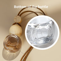 Bouteille diffuseur de parfum pour voiture en verre transparent rond de 8 ml, 10 ml, 15 ml avec bouchon en bois naturel, design portable à suspendre, parfaite