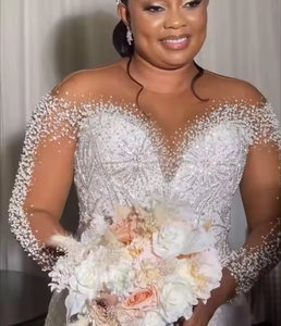S00132L Nouvelle Robe de Mariée Sexy Haut de Gamme 2026 Blanche à Manches Longues, Col Rond, Taille Cintrée et Traîne Longue en Dentelle Perlée - Product Image 1