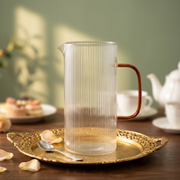 Mug en verre borosilicate résistant à la chaleur 1L, anti-explosion, prêt pour l'infusion de thé, pour bureau et bar, personnalisation en gros du logo