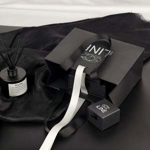 Custom Logo Embossing Printed Clothing Cardboard Retail Paper Shopping <b>Bag</b> Luxury Gift Packaging Paper <b>Bags</b> With Handle Rope - Product Image 6