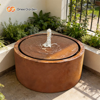 Fontaine d'eau ronde en acier corten rouillé