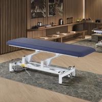 Table de chiropratique électrique réglable en hauteur, confortable et multifonctionnelle, idéale pour les salles de sport, les spas et les hôtels.