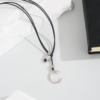 Collier tendance avec pendentif lune et étoile, chaîne en corde noire, style lariat, pendentif croissant de lune argenté, bijoux bohèmes, cadeau unisexe
