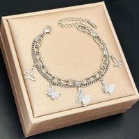 Bracelets joncs vintage en acier inoxydable avec chaîne et maillons, motif papillon, zircon et plaqué or pour femme – Idéal comme cadeau tendance (vente en gros)