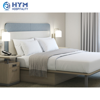 Ensemble de chambre à coucher de luxe 2026 Homewood Suites en bois de chêne massif moderne, écologique, avec tête de lit et table de chevet sur mesure de haute qualité
