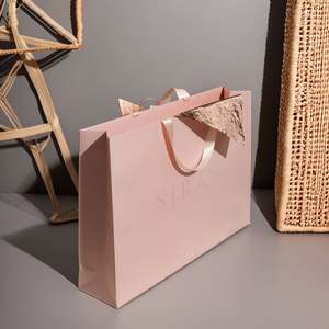 Wholesale Luxury Eco-Friendly <b>Pink</b> <b>Paper</b> <b>Bags</b> with Ribbon Custom Logo Lamination for Mother's Day Clothing Shoes Gifts - Product Image 1
