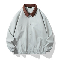 Veste coupe-vent OEM décontractée pour hommes de 100 grammes en toile avec ourlet élastique et col tournant de couleur contrastée pour le printemps logo personnalisé