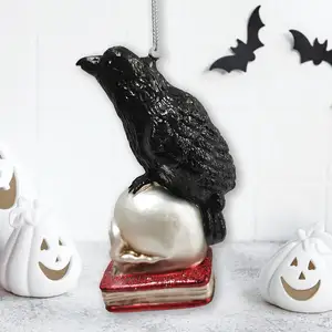 Fabbrica di corvo su teschio e libro ornamento di vetro, decorazione ornamentale di Halloween eco-friendly