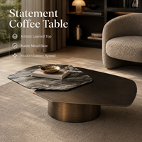 Table basse design à deux niveaux, surface en pierre frittée, base en bronze brossé, style moderne et luxueux pour salon