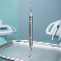 Pince chirurgicale dentaire manuelle en acier inoxydable, type faucille, 130 mm, avec applicateur élastique pour chirurgie buccale