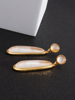Boucles d'oreilles longues en coquille d'ormeau plaquée or véritable, au design élégant et texturé, pour femmes et jeunes filles, qui subliment la personnalité.