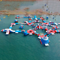 Parc aquatique géant gonflable en PVC personnalisé avec logo personnalisé pour les enfants et les adultes utilisation plage d'été