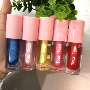 ลิปออยล์ใส กลิตเตอร์วิ้งค์ บรรจุภัณฑ์หลอดผลไม้สีรุ้ง ขายส่ง รับทำโลโก้ เนื้อเนียน ฉ่ำวาว สำหรับคนรักกลิตเตอร์ - Product Image 1