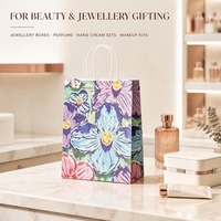 Sac cadeau en papier imprimé floral avec logo personnalisé et poignée en papier torsadé pour emballage de cosmétiques et de parfums, vente en gros