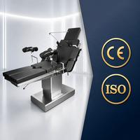 Table d'opération électrique à trois fonctions avec surface radiolucente, hauteur 650-950 mm, 180 kg