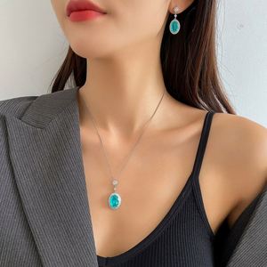 Conjunto de Collar y Pendientes Delicados, Minimalistas y Ecológicos de Cobre con Circonita Paraíba para Mujer, para un Estilo Refinado Diario - Product Image 1