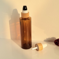 Bouteille en verre ambré personnalisée avec logo, couvercle en bambou, verre givré avec tête de pompe, couvercle en bambou pour cosmétiques, flacon pompe pour lotion
