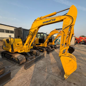 Mini-excavatrice Komatsu PC56 d'occasion, excellent état, adaptée à la construction et à l'agriculture - Product Image 1