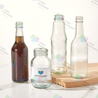 Klare Glas-Saucenflasche 5oz 8oz 12oz 16oz Woozy-Flasche mit Schwarzem Kunststoffdeckel für Scharfe Sauce BBQ Ketchup Olivenöl Großhandel