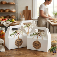 Boîtes à poignée en papier blanc écologiques, multi-usages, professionnelles et personnalisées pour les projets d'emballage de boulangerie et de confiserie de haute qualité