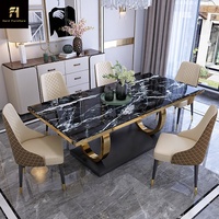 Table à manger rectangulaire en marbre moderne de luxe au design unique en or et noir