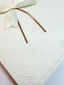 Custom Creative Ivory Board Paper Women Gift Bag <b>With</b> Flat Handles Embossed Design Ribbon <b>Bow</b> Rectangle Gift Bag For Clothes - Product Image 2