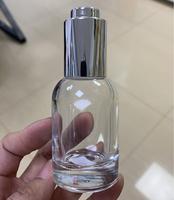 Flacon de sérum de luxe 30 ml 15 ml avec bouton poussoir, cosmétiques avec pipette compte-gouttes en aluminium, flacon en verre pour huile essentielle