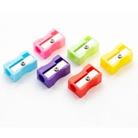 Taille-crayon en plastique à trou unique en gros, logo personnalisé, portable, fournitures scolaires, fournitures de bureau, outil de papeterie de bureau