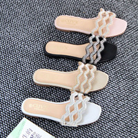 Sandales plates de haute qualité pour femmes romaines d'été en gros de mode, sandales à motifs de diamants brillants, chaussures de plein air décontractées