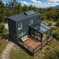 MJIAMJU Maison préfabriquée de luxe sur mesure de 40 pieds à 2 étages, structure en acier coloré, verre trempé, design moderne, véranda, terrasse en bois