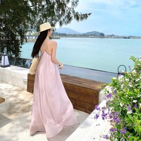 Robe longue style halter OEM pour l'été, les vacances à la plage et les voyages, avec dos ouvert tendance et coupe ample