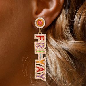 Pendientes de cuentas de arroz tejidos a mano, coloridos regalos bohemios para la escuela, graduados y profesores - Product Image 1