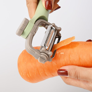 Éplucheur rotatif multifonction vert pour fruits et légumes avec couteau dissimulé, design polyvalent, lavage à la main uniquement - Product Image 5